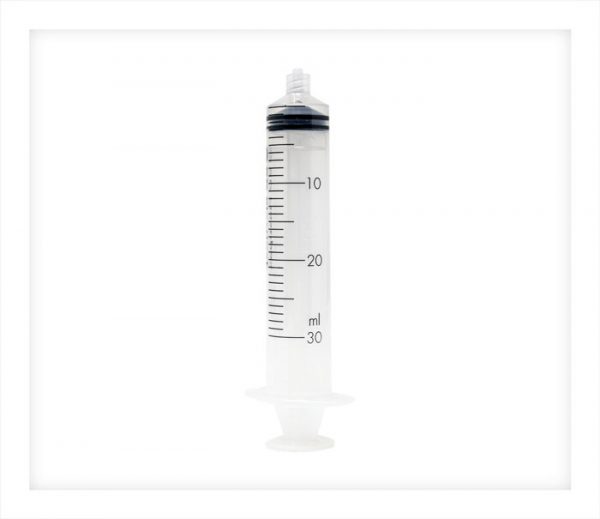 A 30 millilitre syringe